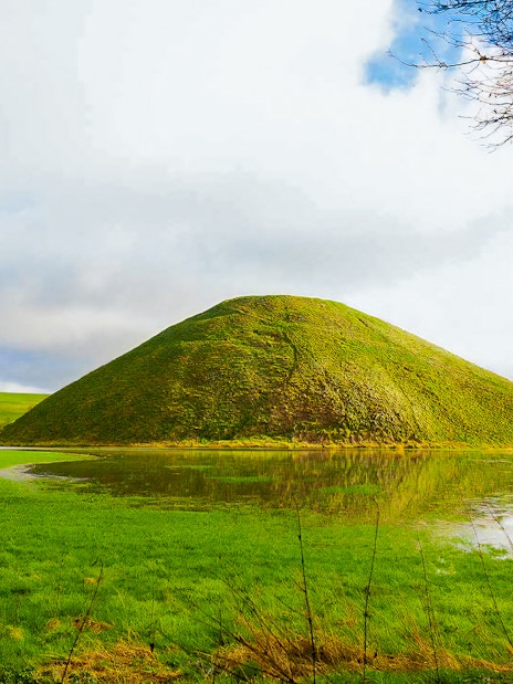 Avebury hill and pond view on Stonehenge & Avebury tour from London.