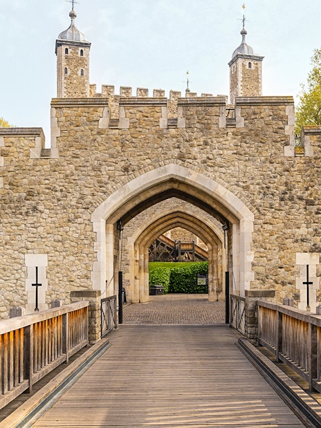 Tower of London with iconic White Tower and surrounding medieval fortress walls.
