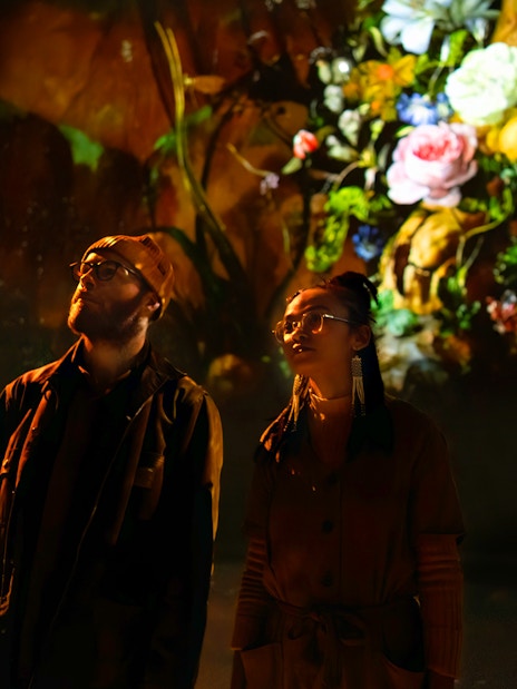 Tourist looking at exhibit at the gallery - Beyond Reality