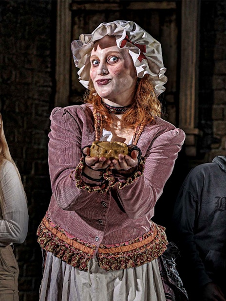 Mrs Lovett's Pie Shop interior at London Dungeon with vintage decor and pie display.