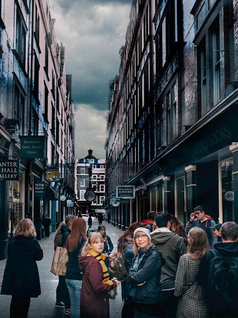 Visitors on a walking tour at Harry Potter film locations in London, near iconic series sites.