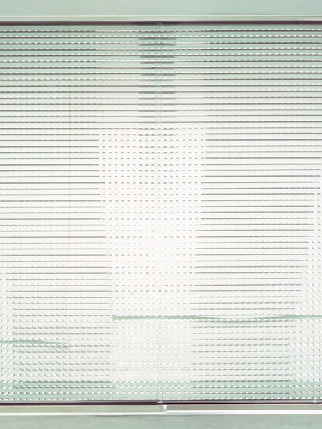 Visitors lining up at the entrance of Moco Museum in London, ready to use their entrance tickets for a day of art exploration