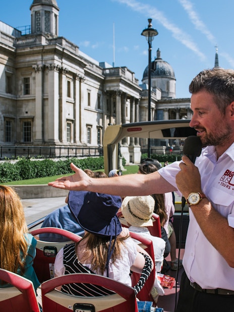 Tourists exploring the Tower of London with a guide, part of the London Explorer Pass by Go City.