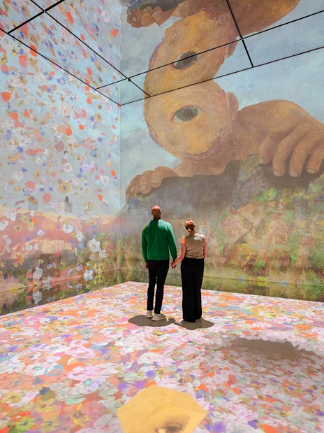 Immersive digital art display at Frameless London, showcasing vibrant abstract visuals.