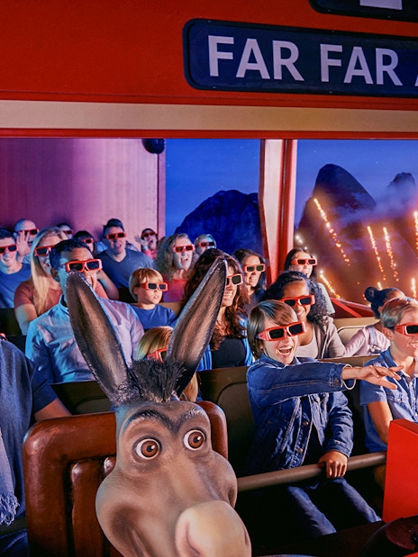 Visitors enjoying the Shrek's Adventure! London Tickets tour, featuring interactive Shrek-themed activities and exhibits in London, UK