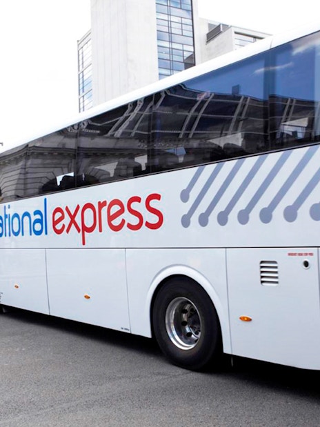 National Express bus at London Gatwick Airport for round-trip tickets to Victoria Station.