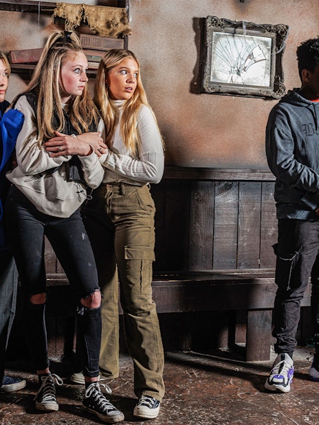 Visitors experiencing a scare moment at London Dungeons during the Scare and Share tour.