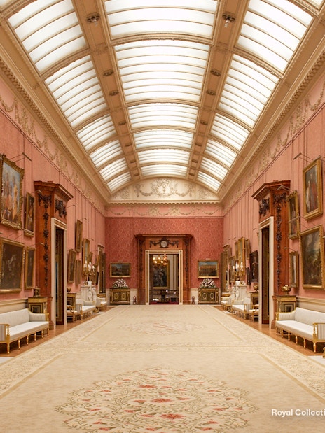 Buckingham Palace Picture Gallery with visitors exploring art displays in London.