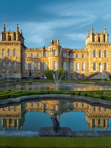 Blenheim Palace gardens with historic architecture, part of Downton Abbey Village & Cotswolds tour.