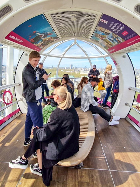 Tourist inside London Eye