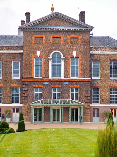 Kensington Palace exterior with gardens in London, England.