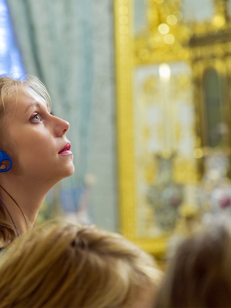 Visitor observing contemporary art at Moco Museum, Barcelona.