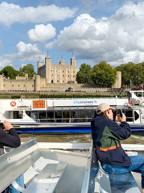 Tower of London viewed from a sightseeing cruise on the River Thames in London.