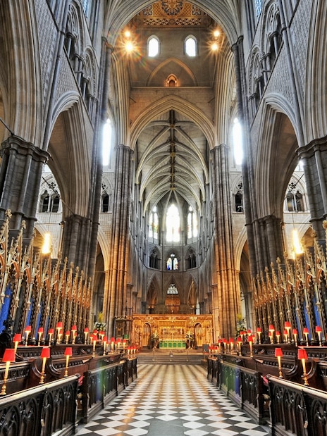 Westminster Abbey exterior with tourists, part of combo tour with Tower of London tickets.