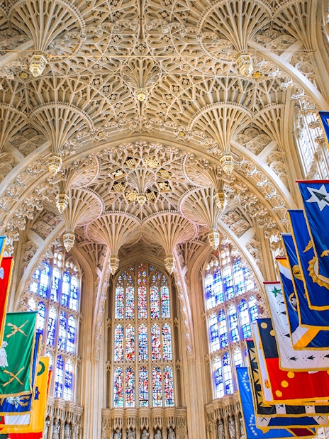 Lady Chapel interior at Westminster Abbey, showcasing intricate Gothic architecture and stained glass windows.