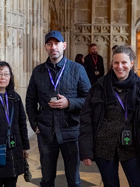 Visitors exploring Windsor Castle with guide and audio guide in Windsor, England.