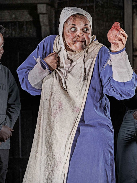 Visitors exploring the London Dungeon with VIP access, featuring historical exhibits and immersive experiences.