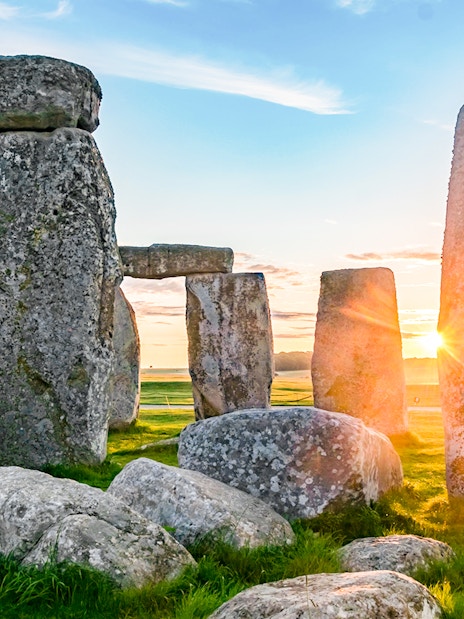Stonehenge with tourists on a guided tour from London.