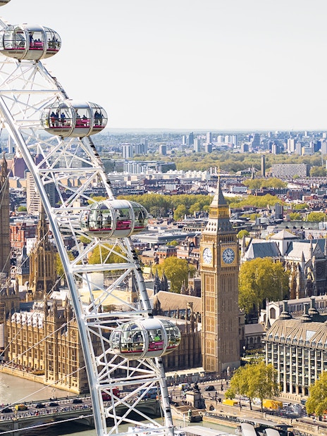 London Eye Ferris wheel overlooking the River Thames in London, England.