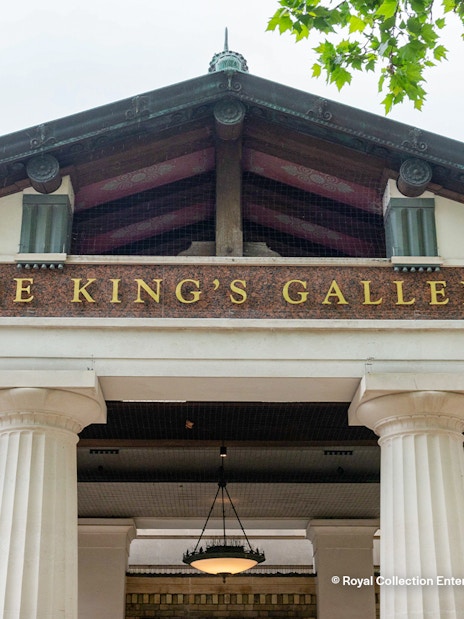 Entrance to The Kings Gallery at Buckingham Palace with ornate architecture and historical significance.